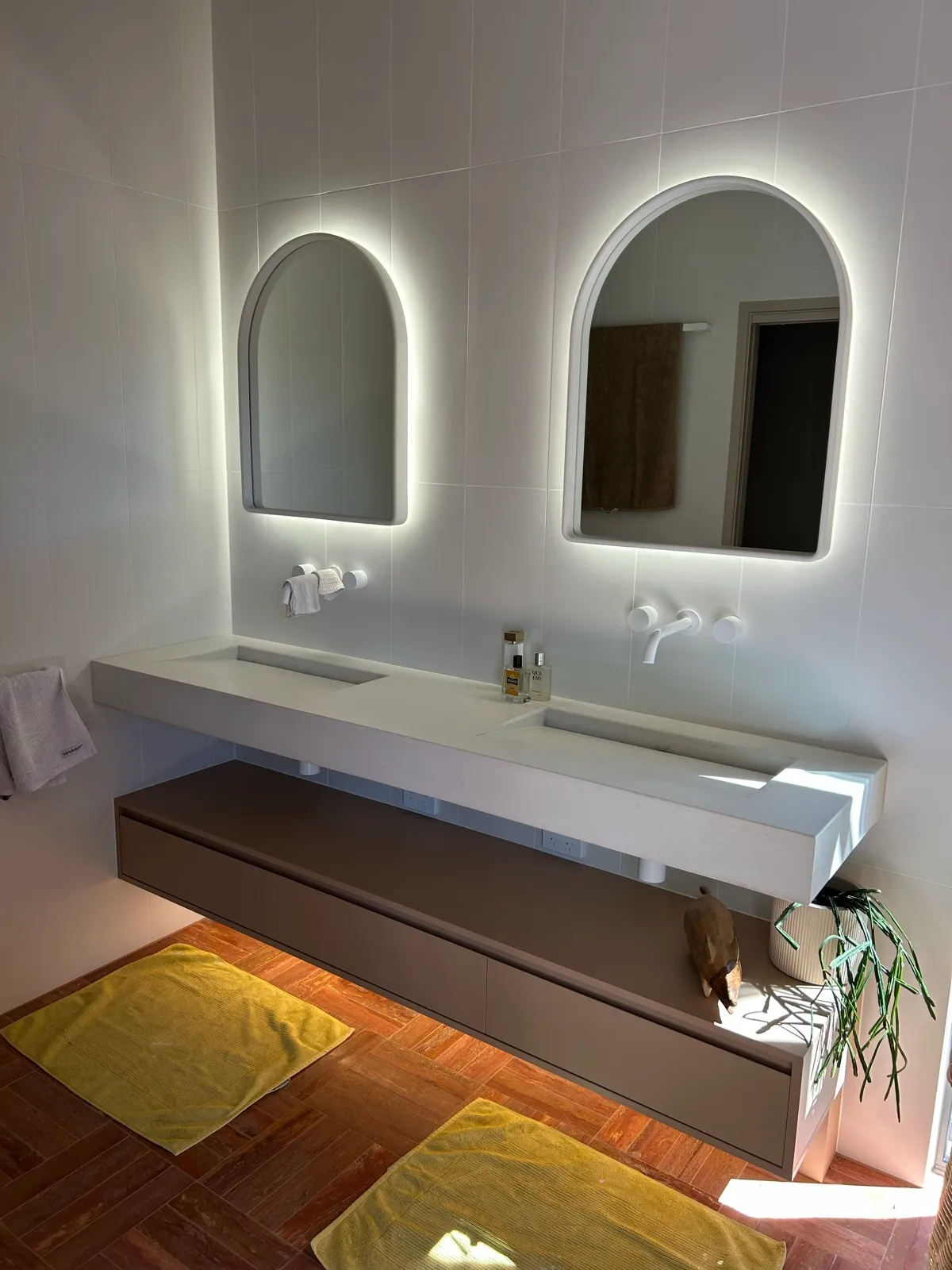 Backlit bathroom mirrors