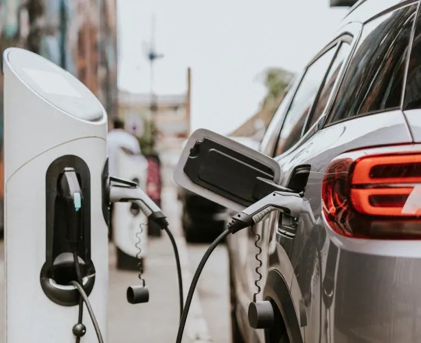 Electric car plugged into a charging station